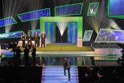 21 October 2011; Dublin footballer Michael Darragh Macauley walks up onto the stage to receive his award from Uachtarán CLG Criostóir Ó Cuana at the GAA GPA All-Star Awards 2011 sponsored by Opel. National Convention Centre, Dublin. Picture credit: Brendan Moran / SPORTSFILE