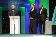 21 October 2011; Uachtarán CLG Criostóir Ó Cuana, in the company of and Martin McAleese, makes a speech to recognise the contribution of President Mary McAleese to the GAA and Ireland during her term of office, at the GAA GPA All-Star Awards 2011 sponsored by Opel. National Convention Centre, Dublin. Picture credit: Brendan Moran / SPORTSFILE