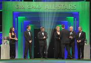 21 October 2011; Mayo footballer Cillian O'Connor is presented with the GAA GPA Young Footballer of the Year by President Mary McAleese, in the company of, from left, Dave Sheeran, Managing Director, Opel Ireland, Dessie Farrell, Chief Executive, GPA, Uachtarán CLG Criostóir Ó Cuana and Martin McAleese, at the GAA GPA All-Star Awards 2011 sponsored by Opel. National Convention Centre, Dublin. Picture credit: Brendan Moran / SPORTSFILE