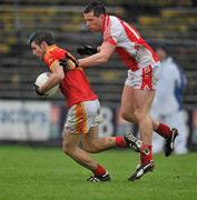 23 October 2011; Donal Newcombe, Castlebar Mitchels, in action against Padraig O'Connor, Ballintubber. Mayo County Senior Football Championship Final, Castlebar Mitchels v Ballintubber, McHale Park, Castlebar, Co. Mayo. Picture credit: David Maher / SPORTSFILE