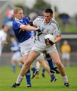 23 October 2011; Shane O'Hagan, Clonoe O'Rahilly's, in action against Colm McCullagh, Dromore St Dympna's. Tyrone County Senior Football Championship Final, Clonoe O'Rahilly's v Dromore St Dympna's, Healy Park, Omagh, Co. Tyrone. Picture credit: Oliver McVeigh / SPORTSFILE