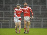 23 October 2011; Tony McCloskey and Neil McGarry, right, Loughgiel Shamrocks, celebrate after the game. AIB GAA Hurling Ulster Club Senior Championship Final, Loughgiel Shamrocks v Ballycran St Joseph’s, Casement Park, Belfast, Co. Antrim. Photo by Sportsfile