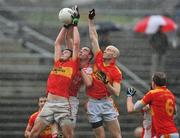23 October 2011; Aidan Walsh, left, and Shane Fitzmaurice, Castlebar Mitchels, in action against Michael Hoban, Ballintubber. Mayo County Senior Football Championship Final, Castlebar Mitchels v Ballintubber, McHale Park, Castlebar, Co. Mayo. Picture credit: David Maher / SPORTSFILE