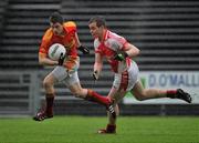 23 October 2011; Neil Douglas, Castlebar Mitchels, in action against Danny Geraghty, Ballintubber. Mayo County Senior Football Championship Final, Castlebar Mitchels v Ballintubber, McHale Park, Castlebar, Co. Mayo. Picture credit: David Maher / SPORTSFILE