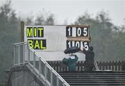 23 October 2011; Scorekeepers move the scoreboards during heavy rain between Ballintubber and Castlebar Mitchels. Mayo County Senior Football Championship Final, Castlebar Mitchels v Ballintubber, McHale Park, Castlebar, Co. Mayo. Picture credit: David Maher / SPORTSFILE