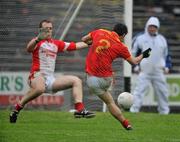 23 October 2011; Donal Newcombe, Castlebar Mitchels, has his goal bound shot stopped by Ballintubber goalkeeper Brendan Walsh. Mayo County Senior Football Championship Final, Castlebar Mitchels v Ballintubber, McHale Park, Castlebar, Co. Mayo. Picture credit: David Maher / SPORTSFILE