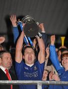 23 October 2011; Eoin McCusker, Dromore St Dympna's, holds aloft the O'Neill cup. Tyrone County Senior Football Championship Final, Clonoe O'Rahilly's v Dromore St Dympna's, Healy Park, Omagh, Co. Tyrone. Picture credit: Oliver McVeigh / SPORTSFILE