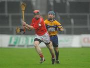 23 October 2011; Gearoid O'Donnell, Crusheen, in action against Robert Conlon, Sixmilebridge. Clare County Senior Hurling Championship Final, Sixmilebridge v Crusheen, Cusack Park, Ennis, Co. Clare. Picture credit: Diarmuid Greene / SPORTSFILE