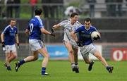 23 October 2011; Hugh McNulty, Dromore St Dympna's, in action against Colm Doris, Clonoe O'Rahilly's. Tyrone County Senior Football Championship Final, Clonoe O'Rahilly's v Dromore St Dympna's, Healy Park, Omagh, Co. Tyrone. Picture credit: Oliver McVeigh / SPORTSFILE