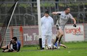 23 October 2011; Shane Coney, Clonoe O'Rahilly's, turns to celebrate after scoring a goal against Ryan McMenamin, Dromore St Dympna's. Tyrone County Senior Football Championship Final, Clonoe O'Rahilly's v Dromore St Dympna's, Healy Park, Omagh, Co. Tyrone. Picture credit: Oliver McVeigh / SPORTSFILE