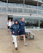 24 October 2011; Uachtarán Chumann Lúthchleas Gael Criostóir Ó Cuana and Ireland manager Anthony Tohill arrive for squad training ahead of their first International Rules match against Australia on Friday October 28th. The training took place in driving rain.  Ireland Training - International Rules Series 2011, Whitten Oval, Barkley Street, Footscray West, Melbourne, Australia. Picture credit: Ray McManus / SPORTSFILE