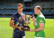 27 October 2011; Brad Green, the Australian captain, and the Ireland vice-captain Ciaran McKeever with the Cormac McAnallen Cup after a press conference ahead of their first International Rules match against Australia on Friday October 28th. Pre match press conference - International Rules Series 2011, Etihad Stadium, Melbourne, Australiaa. Picture credit: Ray McManus / SPORTSFILE