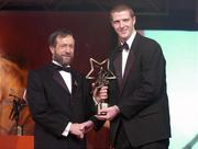26 November 2004; Henry Shefflin of Kilkenny, is presented with his All-Star award by Sean Kelly, President of the GAA, at the 2004 Vodafone GAA All-Star Awards. Citywest, Dublin. Picture credit; Brendan Moran / SPORTSFILE