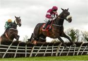 26 April 2017; Champagne Classic, right, with Bryan Cooper up, jump the last on their way to winning the Irish Daily Mirror Novice Hurdle at Punchestown Racecourse in Naas, Co. Kildare. Photo by Seb Daly/Sportsfile