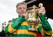 27 April 2017; Noel Fehily holds the trophy after winning the Ladbrokes Champion Stayers Hurdle on Unowhatimeanharry at Punchestown Racecourse in Naas, Co. Kildare. Photo by Seb Daly/Sportsfile