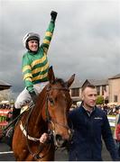 27 April 2017; Jody McGarvey celebrates as he enters the winners' enclosure after winning the Ryanair Novice Steeplechase on Great Field at Punchestown Racecourse in Naas, Co. Kildare. Photo by Seb Daly/Sportsfile