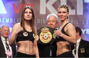 28 April 2017; Katie Taylor, left, and Nina Meinke during the weigh-in at Wembley Arena in London, England. Photo by Lawrence Lustig/Sportsfile