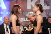 28 April 2017; Katie Taylor, left, and Nina Meinke during the weigh-in at Wembley Arena in London, England. Photo by Lawrence Lustig/Sportsfile