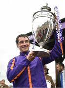 28 April 2017; Jockey Patrick Mullins with the trophy after winning the BETDAQ Punchestown Champion Hurdle on Wicklow Brave at Punchestown Racecourse in Naas, Co. Kildare. Photo by Seb Daly/Sportsfile