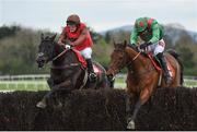 28 April 2017; Balnaslow, right, with Derek O'Connor up, jump the last alongside Mendip Express, left, with David Maxwell up, on their way to winning the Star Best For Racing Coverage Champion Hunters Steeplechase at Punchestown Racecourse in Naas, Co. Kildare. Photo by Seb Daly/Sportsfile