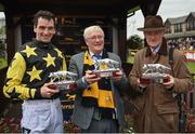 28 April 2017; Jockey Patrick Mullins, left, owner Pat McSweeney, centre, and trainer Willie Mullins hold their trophies after winning the Tattersalls Ireland Champion Novice Hurdle at Punchestown Racecourse in Naas, Co. Kildare. Photo by Seb Daly/Sportsfile