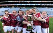 27 October 2011; Galway players, from left to right, Shaun Cunninghan, Joe O'Sullivan, Alan Kerins, Hector O hEochagain, Pat Comer, Des Bishop, and Ronan Scully celebrate with the cup. Alan Kerins Project Charity Match, Galway Selection v Dublin Selection, Croke Park, Dublin. Picture credit: Matt Browne / SPORTSFILE