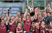 27 October 2011; Galway captain Hector O hEochagain lifts the cup after Dublin selection manager Pat Gilroy, right, had presented it. Alan Kerins Project Charity Match, Galway Selection v Dublin Selection, Croke Park, Dublin. Picture credit: Brian Lawless / SPORTSFILE