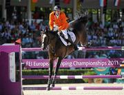 15 September 2011; Eric Van Der Vleuten, and VDL Groep Utascha SFN while competing in second days event at the FEI European Jumping Championships, Club de Campo Villa, Madrid, Spain. Picture credit: Ray McManus / SPORTSFILE
