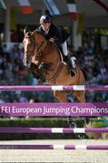 15 September 2011; Michel Robert, with Kellemoi De Pepita while competing in second days event at the FEI European Jumping Championships, Club de Campo Villa, Madrid, Spain. Picture credit: Ray McManus / SPORTSFILE