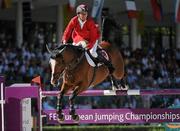 15 September 2011; Beat Mandli, Sitzerland, and Louis while competing in second days event at the FEI European Jumping Championships, Club de Campo Villa, Madrid, Spain. Picture credit: Ray McManus / SPORTSFILE