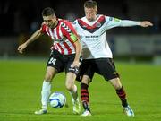 28 October 2011; Daniel Lafferty, Derry City, in action against Ger O'Brien, Bohemians. Airtricity League Premier Division, Derry City v Bohemians, Brandywell, Derry. Photo by Sportsfile