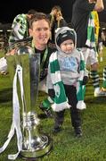 28 October 2011; Gary Twigg, Shamrock Rovers, celebrates at the end of the game with his son Kaiden, age 3, after been presented with Airtricity League Premier Division trophy. Airtricity League Premier Division, Shamrock Rovers v Galway United, Tallaght Stadium, Tallaght, Co. Dublin. Picture credit: David Maher / SPORTSFILE