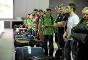 29 October 2011; Ireland players and officials in Melbourne Airport after Qantas flight QF458 to Sydney was cancelled as they waited in Gate 23. The Australian airline Qantas grounded all international and domestic flights with immediate effect due to an industrial dispute moments before the Ireland team were scheduled to depart for Sydney for the 2nd International Rules Test against Australia. Melbourne Airport, Australia. Picture credit: Ray McManus / SPORTSFILE