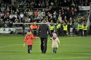 28 October 2011; Shamrock Rovers manager Michael O'Neill leaves the pitch with his two daughters after the game. Airtricity League Premier Division, Shamrock Rovers v Galway United, Tallaght Stadium, Tallaght, Co. Dublin. Picture credit: David Maher / SPORTSFILE