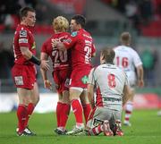 29 October 2011; A dejected Chris Henry, Ulster, looks on as the Scarlets players celebrate. Celtic League, Scarlets v Ulster, Parc Y Scarlets, Llanelli, Wales. Picture credit: Steve Pope / SPORTSFILE
