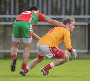 29 October 2011; Shane Supple, St Brigid's, is tackled by Ted Furman, Ballymun Kickhams. Dublin County Senior Football Championship Semi-Final, Ballymun Kickhams v St Brigid's, Parnell Park, Dublin. Picture credit: Stephen McCarthy / SPORTSFILE