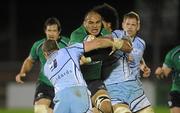 29 October 2011; George Naoupu, Connacht, is tackled by Richie Rees, left, and Maama Molitika, Cardiff Blues. Celtic League, Connacht v Cardiff Blues, Sportsground, Galway. Picture credit: Diarmuid Greene / SPORTSFILE