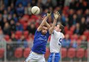 30 October 2011; Enda Muldoon, Ballinderry Shamrocks, wins possession in the air against Ryan McMenamin, Dromore St Dympna’s. AIB Ulster GAA Football Senior Club Championship Quarter-Final, Dromore St Dympna’s v Ballinderry Shamrocks, Healy Park, Omagh, Co. Tyrone. Picture credit: Pat Murphy / SPORTSFILE