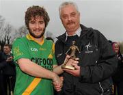 30 October 2011; Ross Murphy, Kill, receives the Man of the Match award from Secretary of the Kildare Hurling Board Aidan Sinnott after the game. Intermediate B Championship Final, Kill v Confey, Naas GAA Ground, Co. Kildare. Picture credit: Barry Cregg / SPORTSFILE