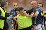 30 October 2011; Crossmaglen Rangers physiotherapist Gerard Nolan clashes with Anto Healy, St. Galls, during the game. AIB Ulster GAA Football Senior Club Championship Quarter-Final, St. Galls v Crossmaglen Rangers, Casement Park, Belfast, Co. Antrim. Photo by Sportsfile