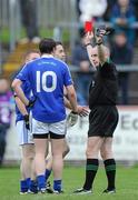30 October 2011; Referee Martin Higgins shows the red card to Raymond Wilson, hidden, Dromore St Dympna’s. AIB Ulster GAA Football Senior Club Championship Quarter-Final, Dromore St Dympna’s v Ballinderry Shamrocks, Healy Park, Omagh, Co. Tyrone. Picture credit: Pat Murphy / SPORTSFILE