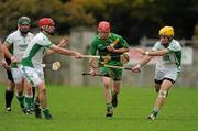30 October 2011; Kevin Crowe, Kill, in action against Conor Delaney, left, and Roger Quinn, right, Confey. Intermediate B Championship Final, Kill v Confey, Naas GAA Ground, Co. Kildare. Picture credit: Barry Cregg / SPORTSFILE