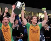 30 October 2011; Corofin joint captains Kieran Fitzgerald, right, and Kieran McGrath celebrate at the end of the game. Galway County Senior Football Championship Final, Tuam Stars v Corofin, Tuam Stadium, Tuam, Co. Galway. Picture credit: David Maher / SPORTSFILE