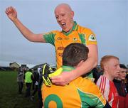 30 October 2011; Alan O'Donovan, Corofin, celebrates at the end of the game with his team-mate Gary Delaney. Galway County Senior Football Championship Final, Tuam Stars v Corofin, Tuam Stadium, Tuam, Co. Galway. Picture credit: David Maher / SPORTSFILE