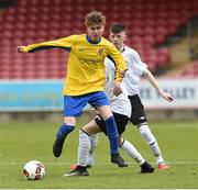 29 April 2017; Stephen Sexton of Carrigaline United AFC in action against Luke O'Neill of Tramore AFC during the FAI Umbro U17 Challenge cup final match between Carrigaline United AFC and Tramore AFC at Turners Cross in Cork. Photo by Matt Browne/Sportsfile
