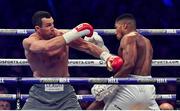 29 April 2017; Anthony Joshua, right, exchanges punches with Wladimir Klitschko during their Heavyweight Championship contest for the IBF, IBO Heavyweight and WBA Super Heavyweight Championships of the World at Wembley Stadium, in London, England. Photo by Brendan Moran/Sportsfile