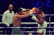 29 April 2017, Anthony Joshua and Wladimir Klitschko exchanges punches during their Heavyweight Championship contest for the IBF, IBO Heavyweight and WBA Super Heavyweight Championships of the World at Wembley Stadium, in London, England. Photo by Brendan Moran/Sportsfile