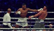 29 April 2017, Anthony Joshua, centre, exchanges punches with Wladimir Klitschko during their Heavyweight Championship contest for the IBF, IBO Heavyweight and WBA Super Heavyweight Championships of the World at Wembley Stadium, in London, England. Photo by Brendan Moran/Sportsfile