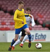 29 April 2017; Dean Ferrissey of Carrigaline United AFC in action against Cameron Kent of Tramore AFC during the FAI Umbro U17 Challenge cup final match between Carrigaline United AFC and Tramore AFC at Turners Cross in Cork. Photo by Matt Browne/Sportsfile