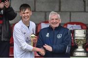 29 April 2017; FAI president Tony Fitzgerald presents Tom Carney with his player of the match trophy after the FAI Umbro U17 Challenge cup final match between Carrigaline United AFC and Tramore AFC at Turners Cross in Cork. Photo by Matt Browne/Sportsfile